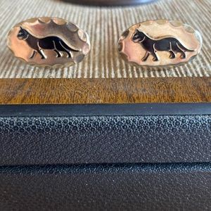 Vintage gold tone oval with black enamel look panther whale toggle cuff links